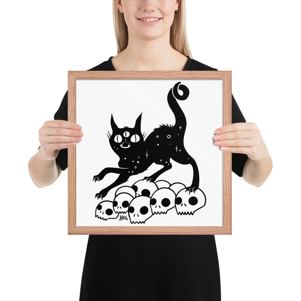 Cat On Skulls, Framed Art Print