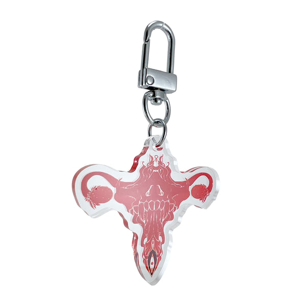 Death Metal Uterus, Keychain in crystal-clear acrylic with durable U-shaped hook clasp.