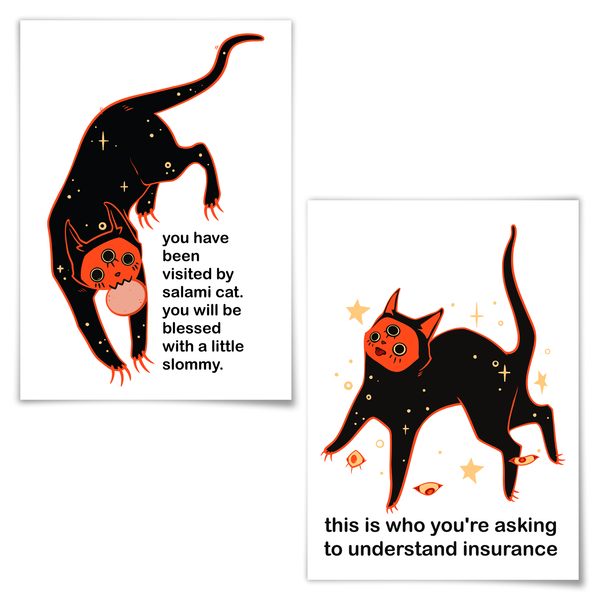 Two white art prints with black and orange illustrations of a cat and humorous text, shown on a light gray background.