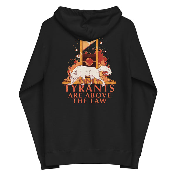 A black pullover hoodie shown from the back, featuring a large graphic print with a white bear, a golden scale of justice, and the text 'TYRANTS ARE ABOVE THE LAW' in orange and white.