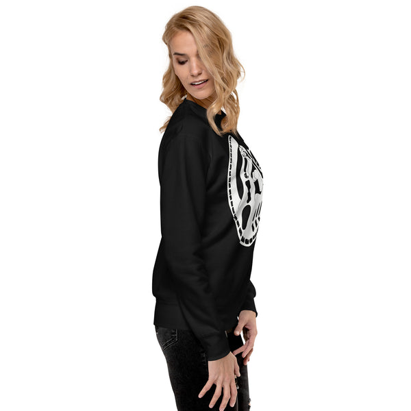 Side view of a woman wearing a black premium unisex sweatshirt featuring a cute cat skeleton illustration.