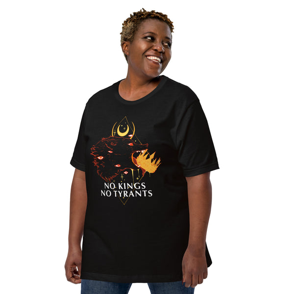 Unisex No Kings Wolf T-Shirt featuring a wolf biting a crown and the phrase 'No Kings No Tyrants' on a black background.