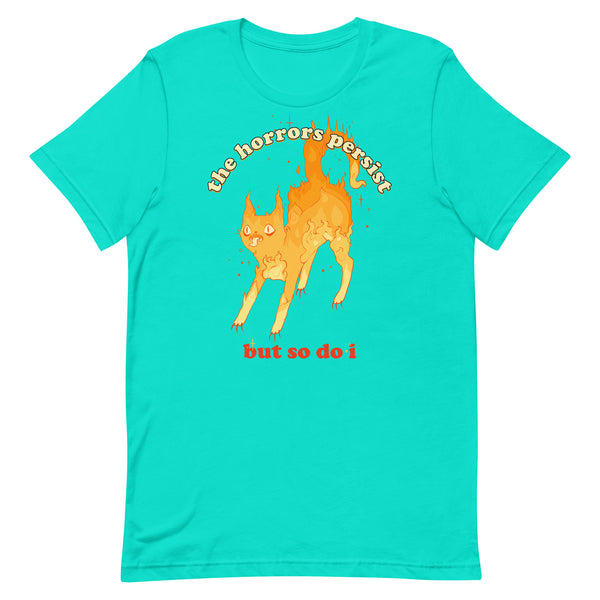 Unisex T-shirt featuring an illustration of a fire cat with the quote 'the horrors persist but so do i' in bright colors.