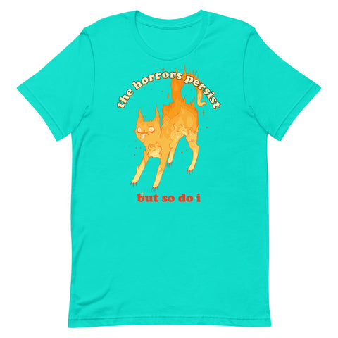 Unisex T-shirt featuring an illustration of a fire cat with the quote 'the horrors persist but so do i' in bright colors.