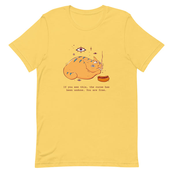 The Curse Has Been Undone, Unisex T-Shirt featuring a cat illustration and fun quote on a yellow t-shirt.