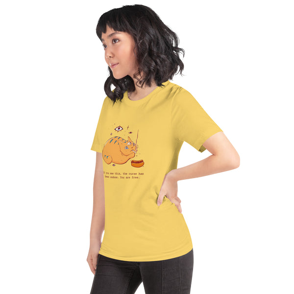 The Curse Has Been Undone, Unisex T-Shirt featuring a cat illustration and humorous quote on a yellow tee.