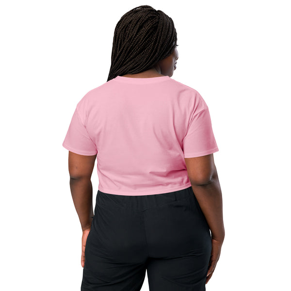 Back view of a model wearing the Amgry Orion, Relaxed Crop Top in soft pink color.