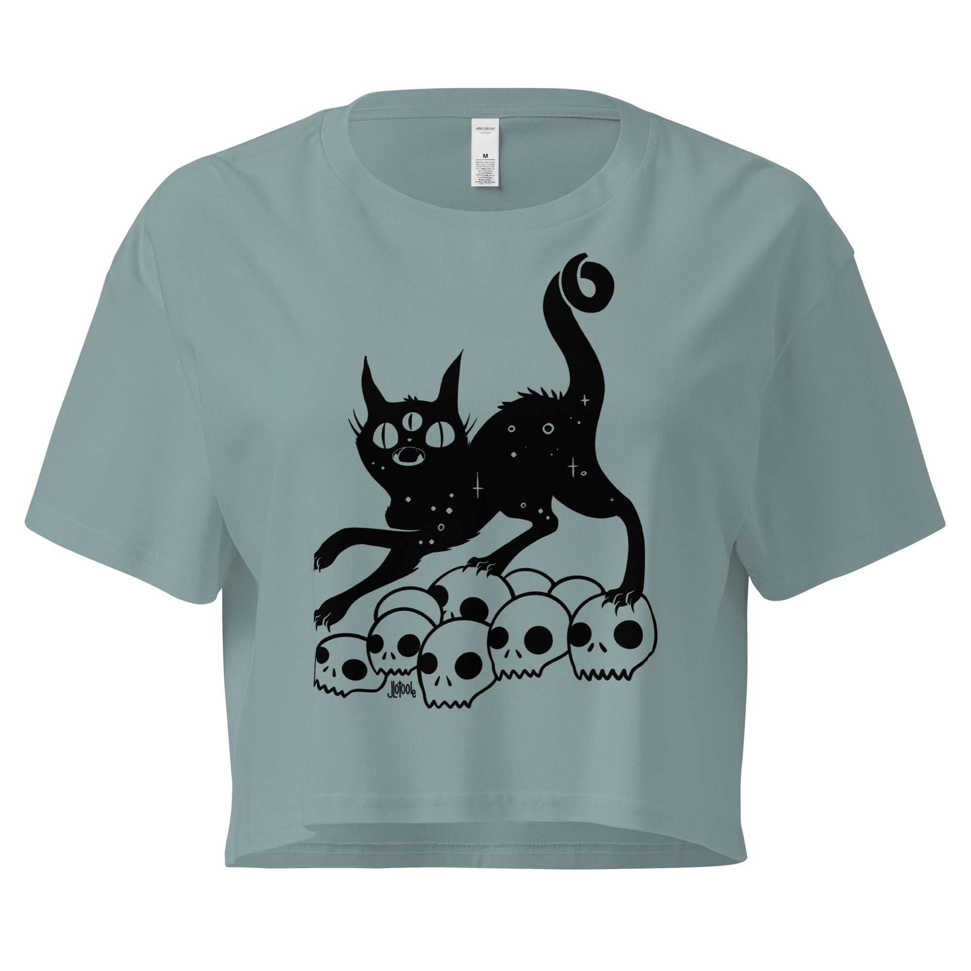 Black crop top featuring a hand-drawn illustration of a black cat on a pile of skulls, relaxed fit, comfortable style.