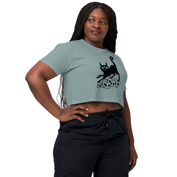 Black cat illustration on a relaxed cropped top, featuring skulls; perfect for casual or alt aesthetics.