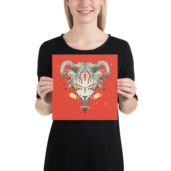 Woman holding a matte art print of a mystical third eye witch illustration on orange background.