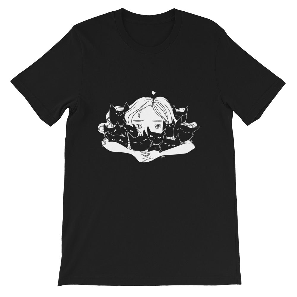 Girl hugging black cats graphic on a unisex black t-shirt, made of soft cotton, eco-friendly fabric.